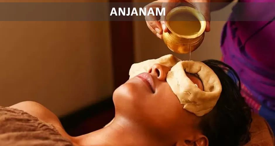 A practitioner performing a traditional Ayurvedic eye treatment